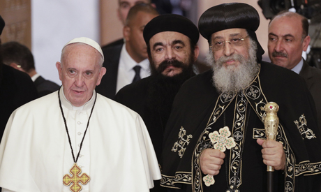 The Catholic Roman Pope Francis of the Vatican meets with Coptic Orthodox Pope Tawadros of Alexandria Egypt in the Coptic Cathedral of Cairo (source: Youm7)