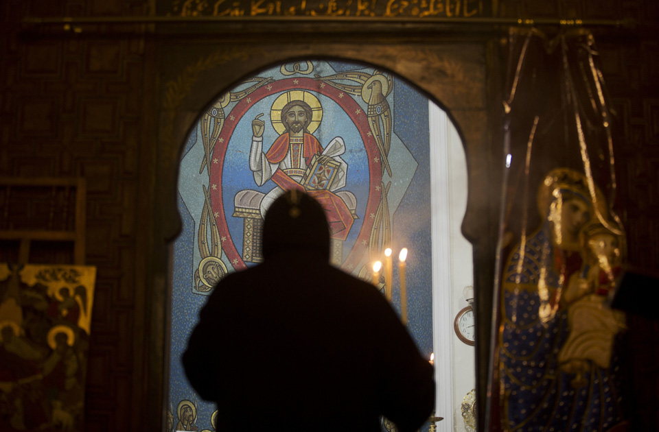 2018-01-21 Praying next to the art at Nativity of Christ Coptic Orthodox Church in Cairo AlAhram