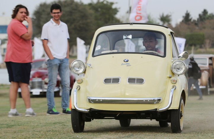 A yellow classic BMW Isetta model is on display at the 7th Cairo Classic Meet in Cairo